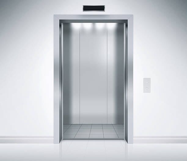 Open elevator with metal doors